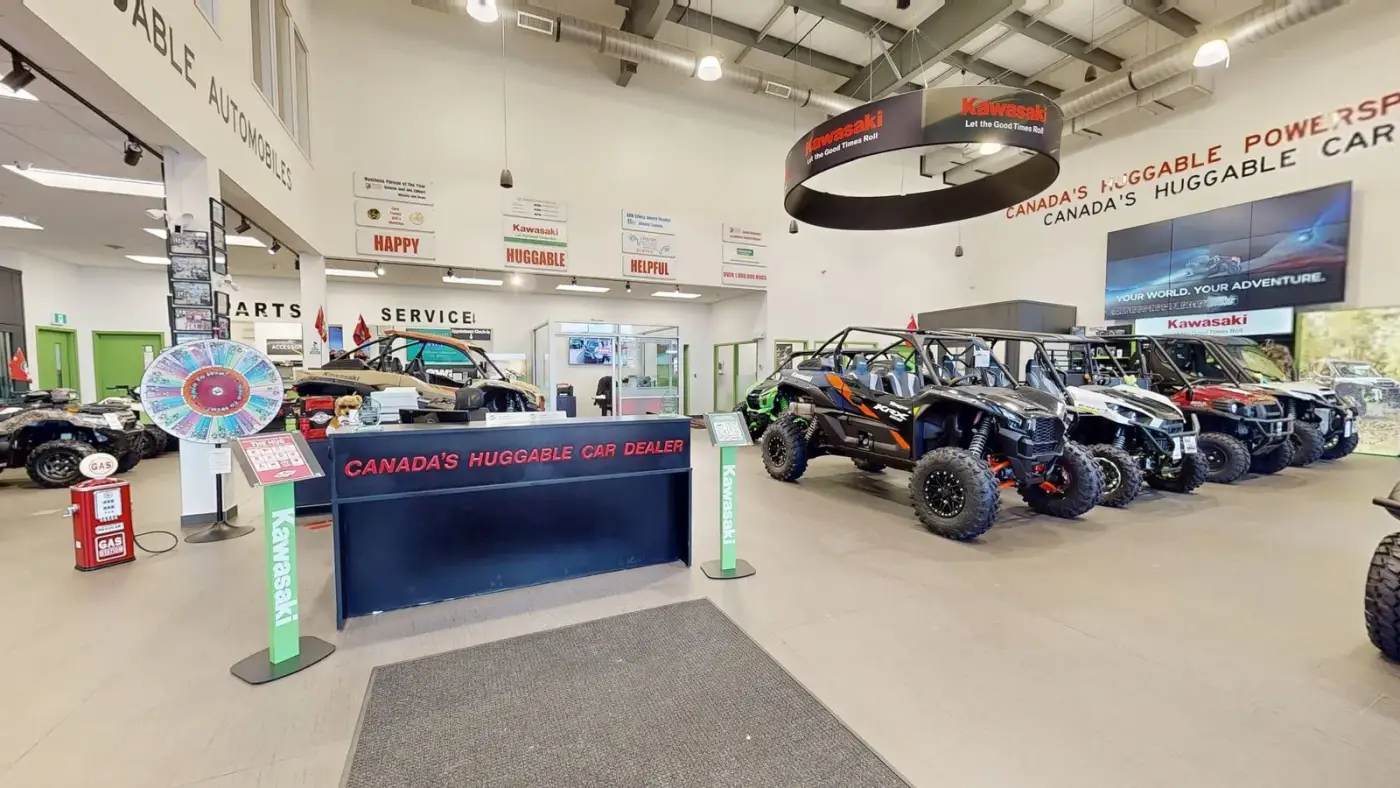 Inside the Jim Gilbert's PowerSports showroom, looking across the sales floor
